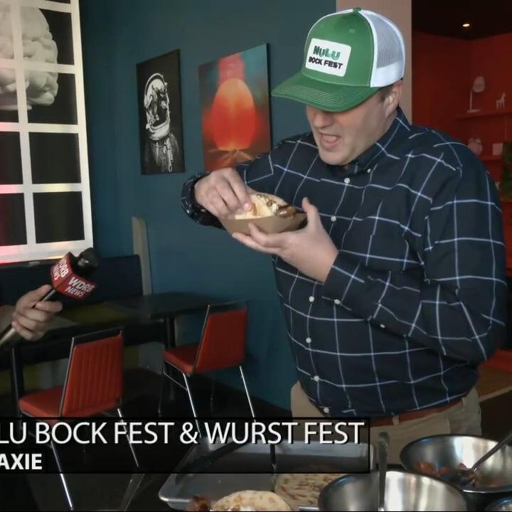 Keith Kaiser finishes his trip to NuLu with a bratwurst being featured in the Wurst Fest